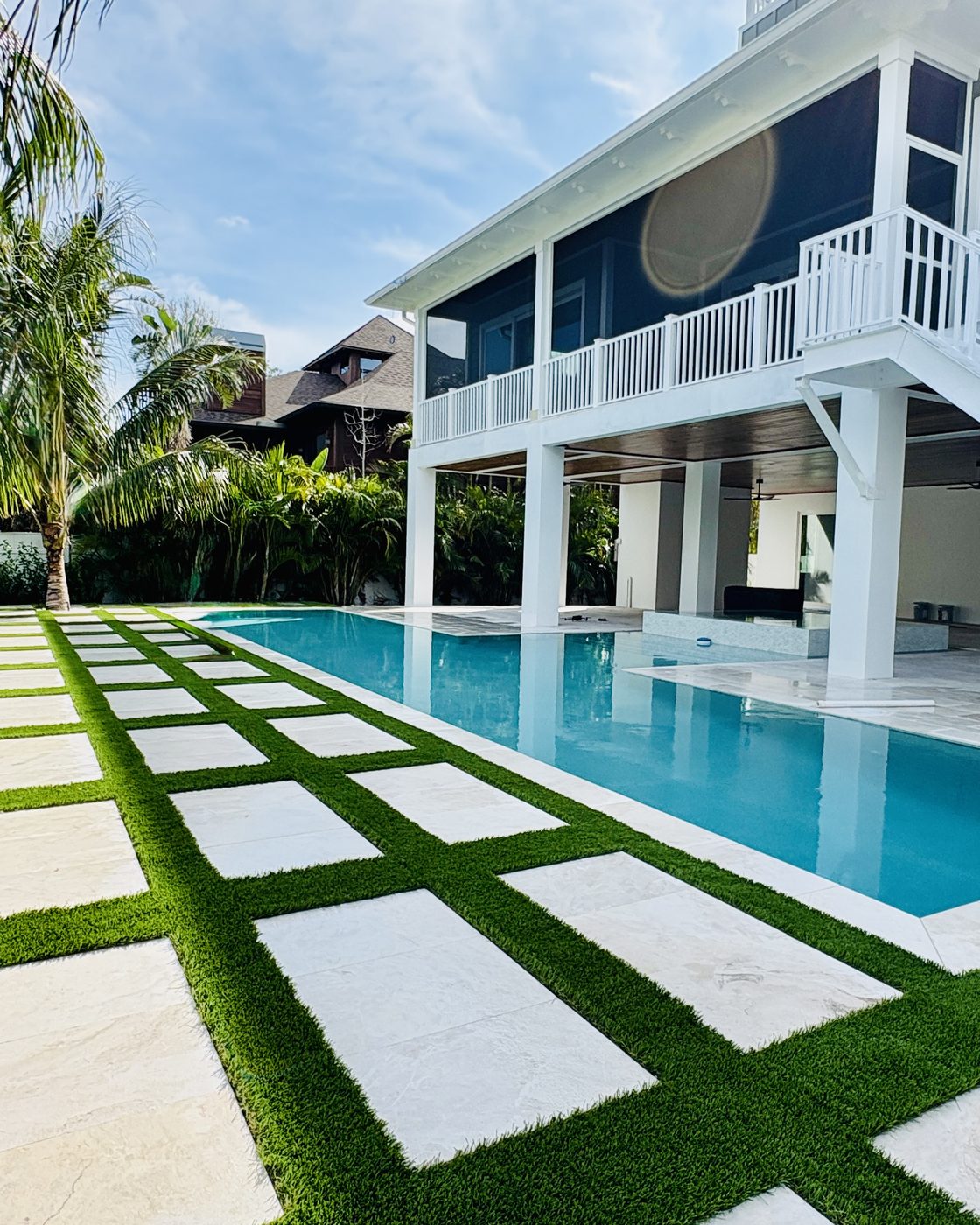 Empire Greens project showing premium hardscape and turf installation